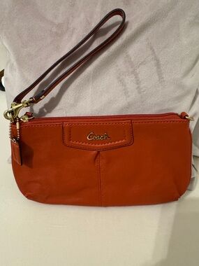 Coach Orange Leather Wristlet with Gold Hardware